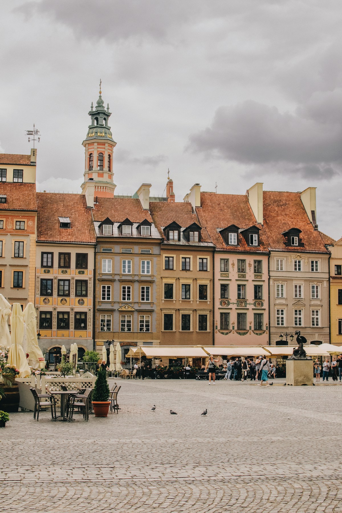 Colourful townhouses and cafés around Warsaw’s Old Town Market Square